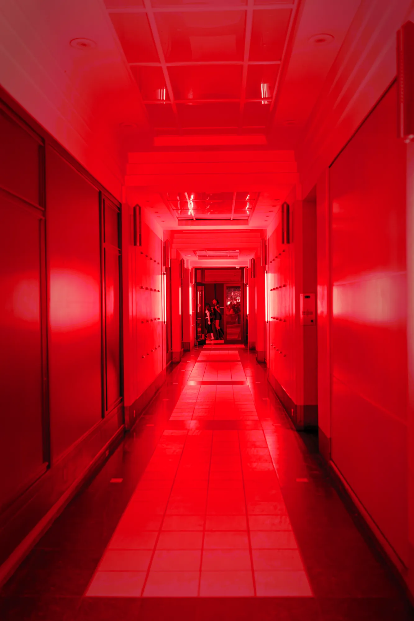 Red entrance corridor leading into Birdy nightclub, Brussels